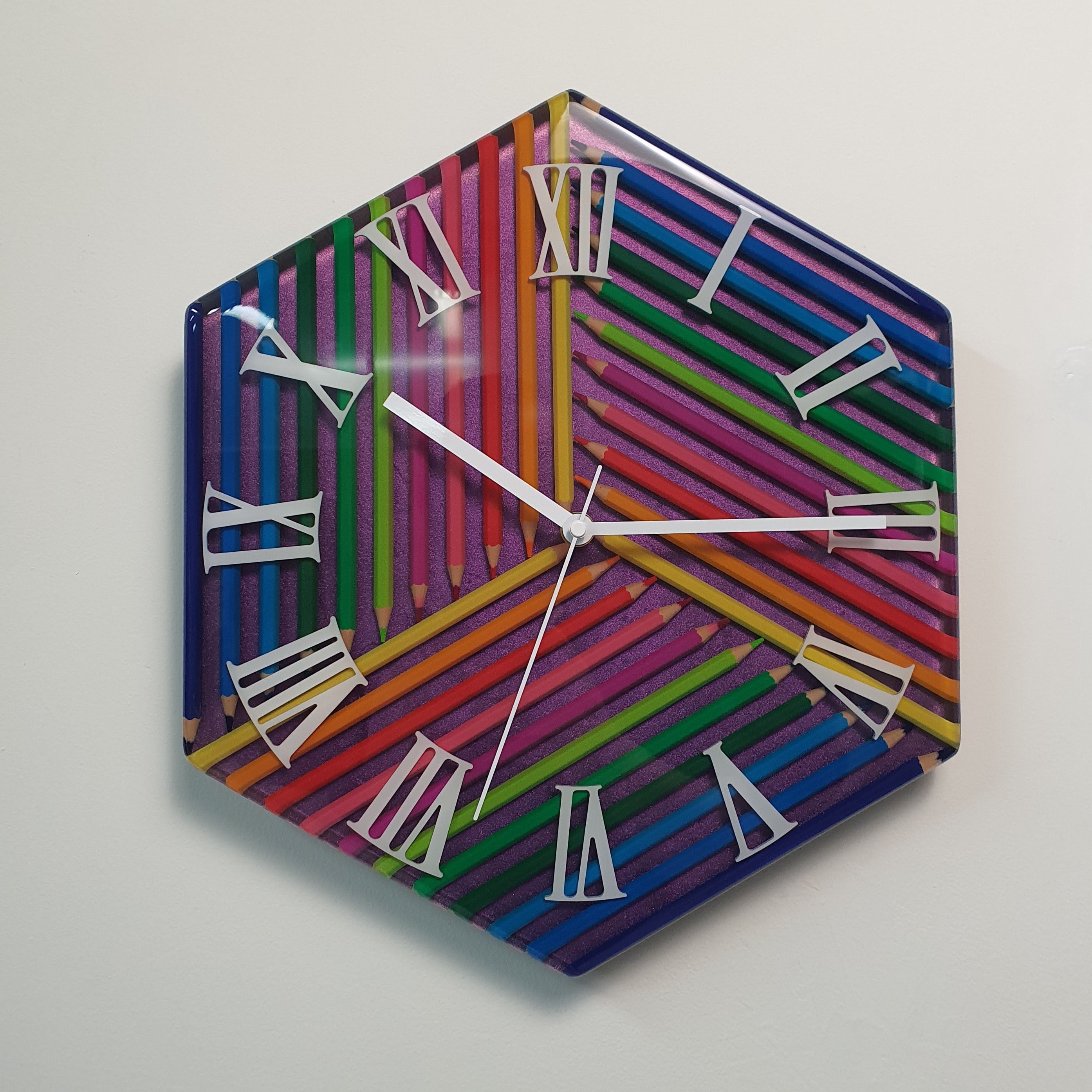 Prism of Time colorful pencil wall clock with white Roman numerals and chameleon background