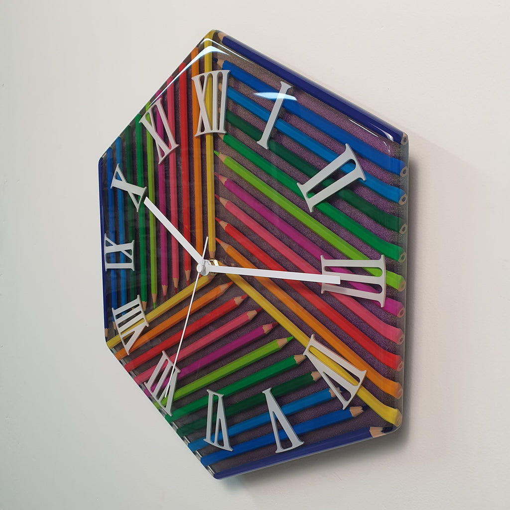 Modern rainbow pencil wall clock with glossy resin finish and plexiglass numerals