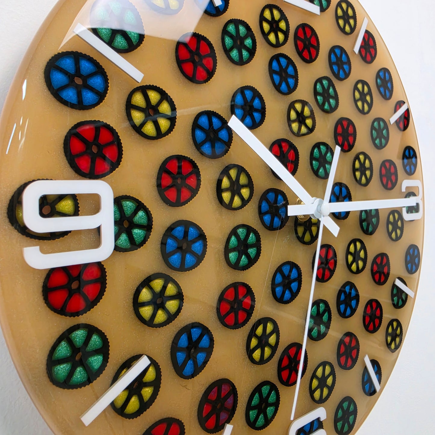 Fluorescent resin clock featuring embedded pasta elements and modern minimalist design