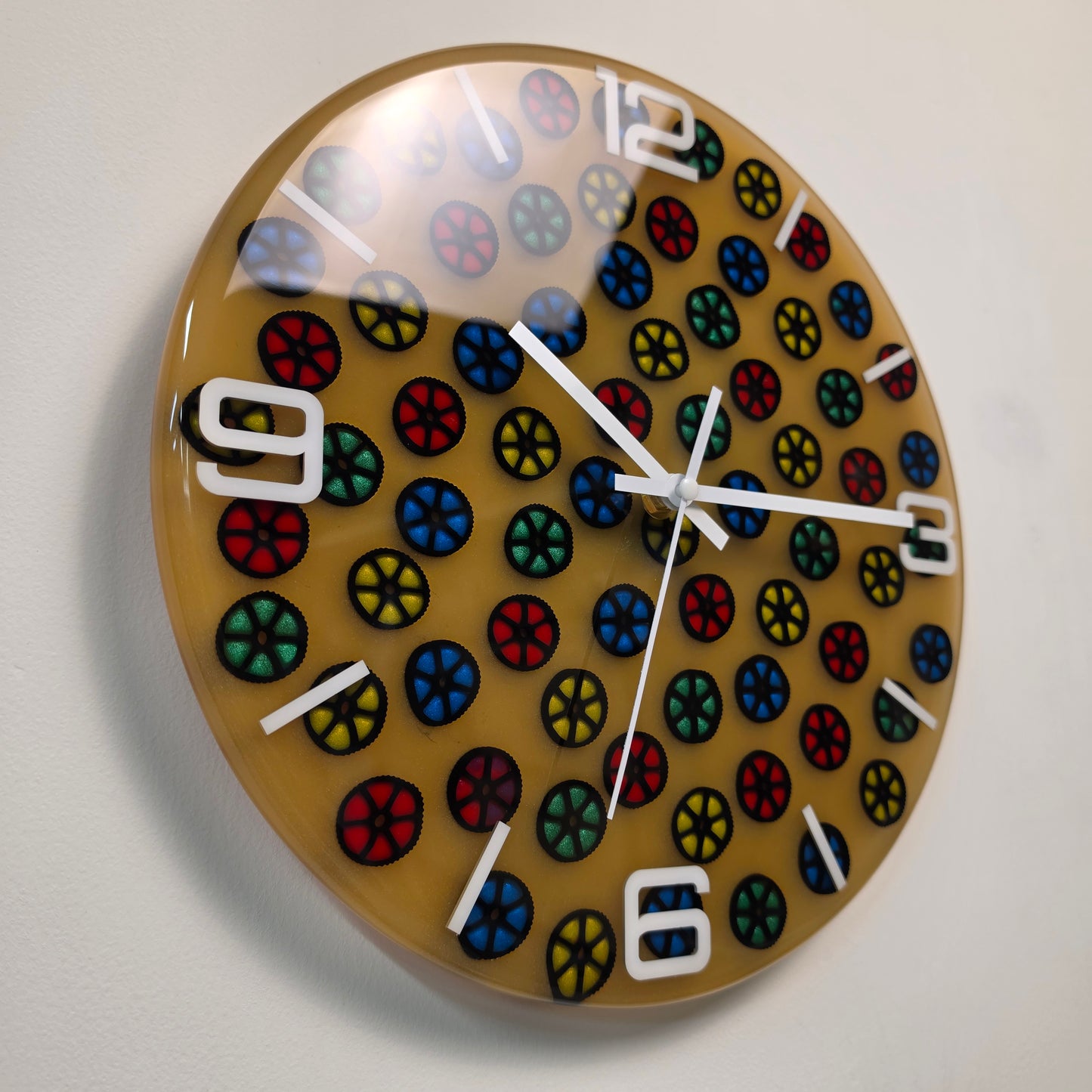 Artistic resin clock with colorful geometric pasta details and glossy finish