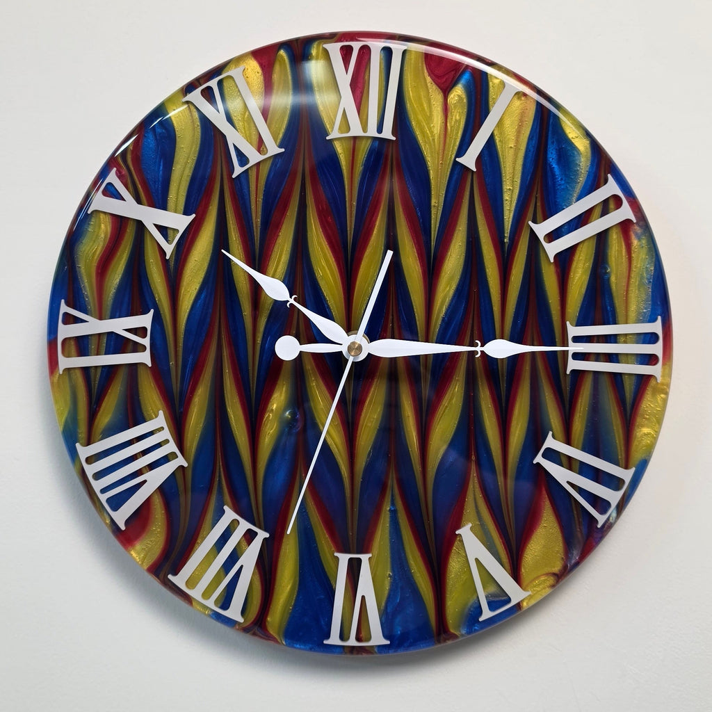 Modern resin wall clock inspired by primary colors and fluid abstract forms