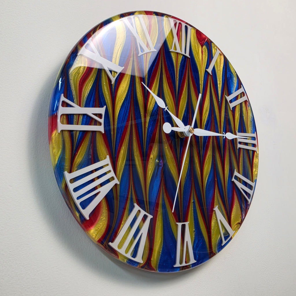Handmade epoxy resin clock featuring flowing primary colors and glossy finish
