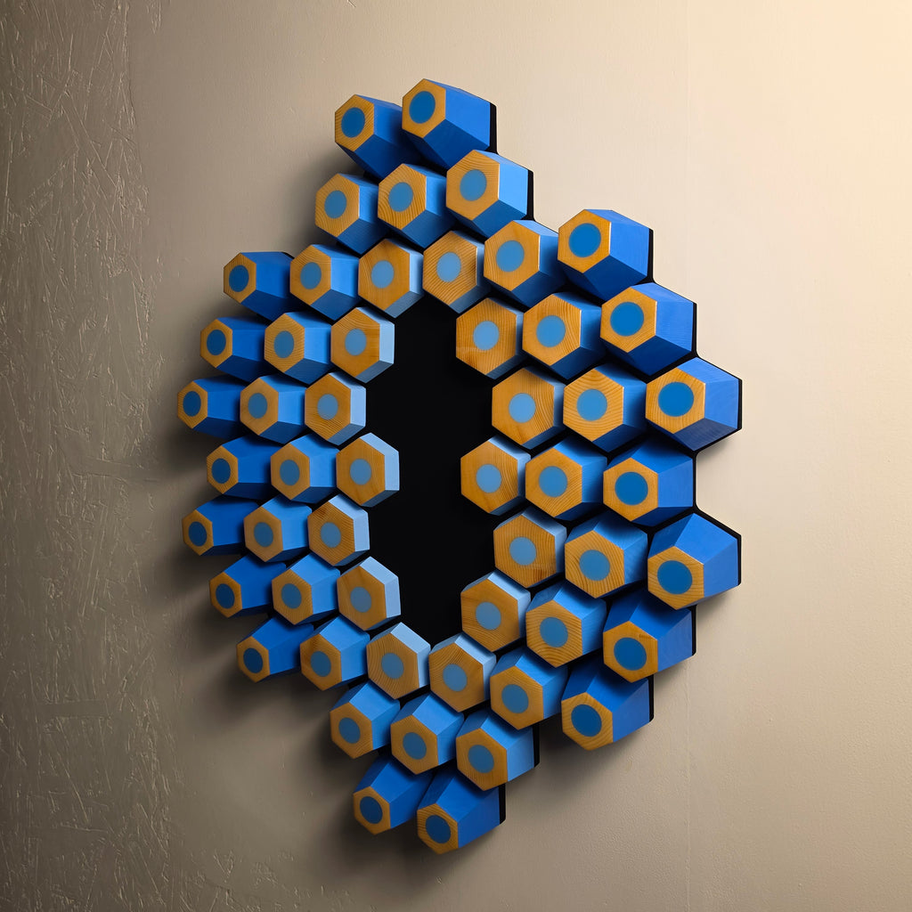Contemporary geometric wall artwork with angled wooden hexagons, glossy resin tops and ultra matte black background