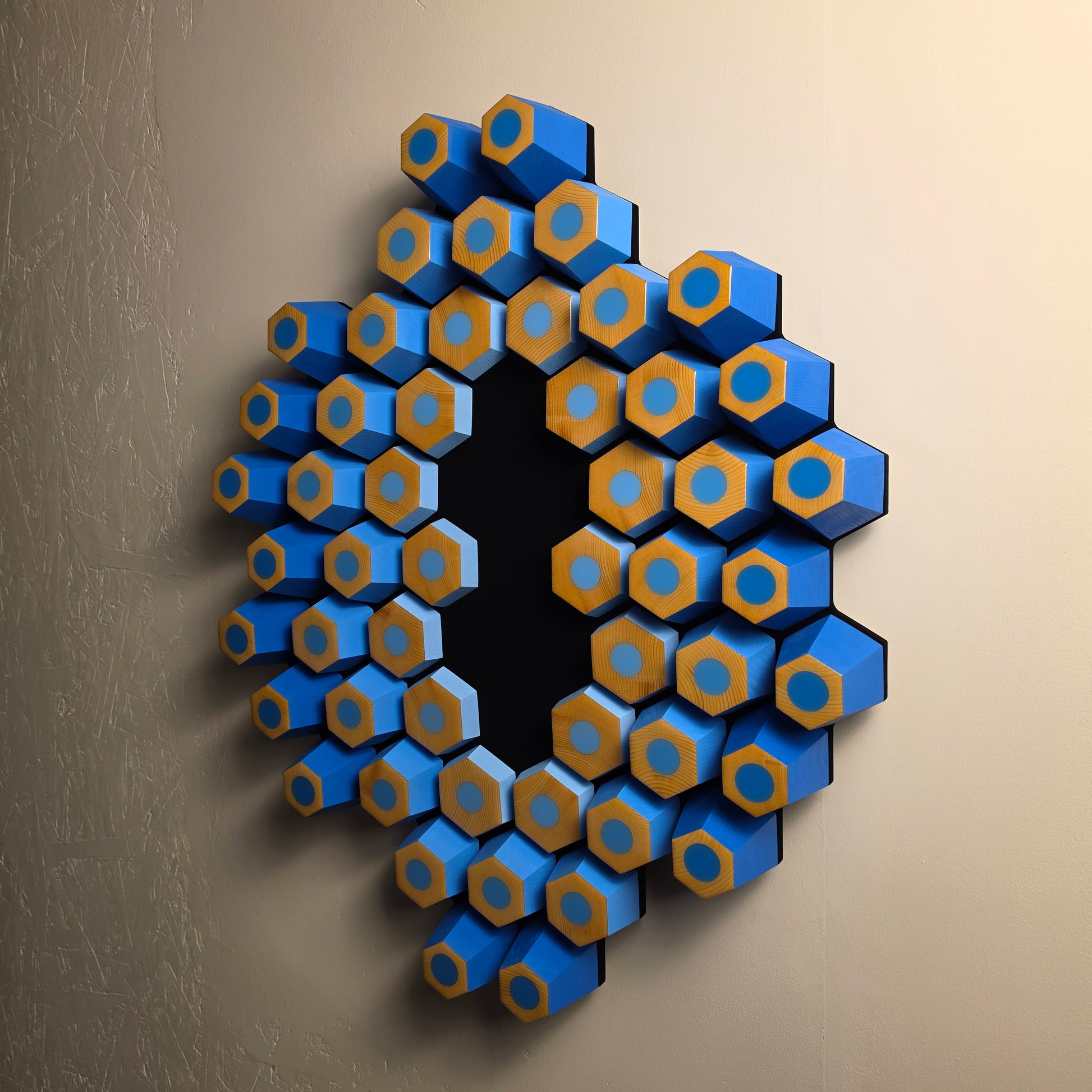 Contemporary geometric wall artwork with angled wooden hexagons, glossy resin tops and ultra matte black background