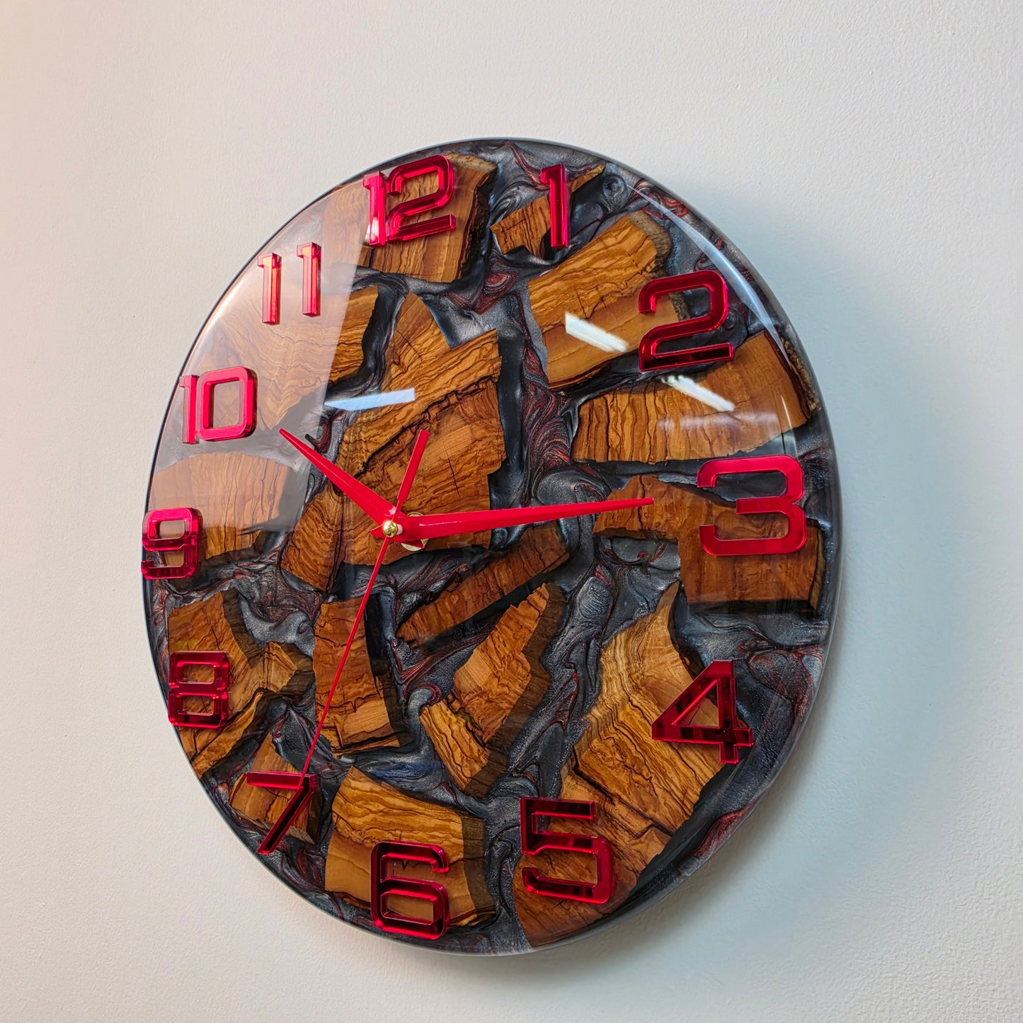 Close-up of olive wood texture and gray epoxy resin details