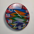 Color Current epoxy resin wall clock with flowing multicolor pattern and white plexiglass numbers