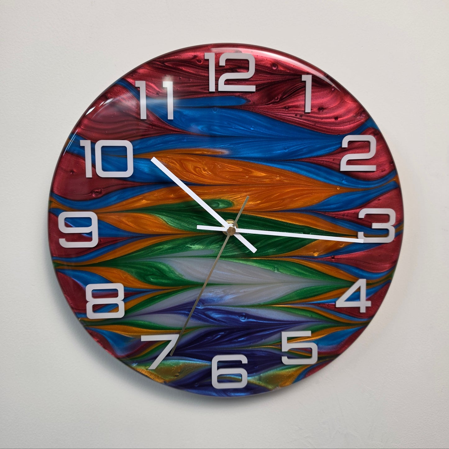 Contemporary handcrafted wall clock with abstract multicolor resin artwork