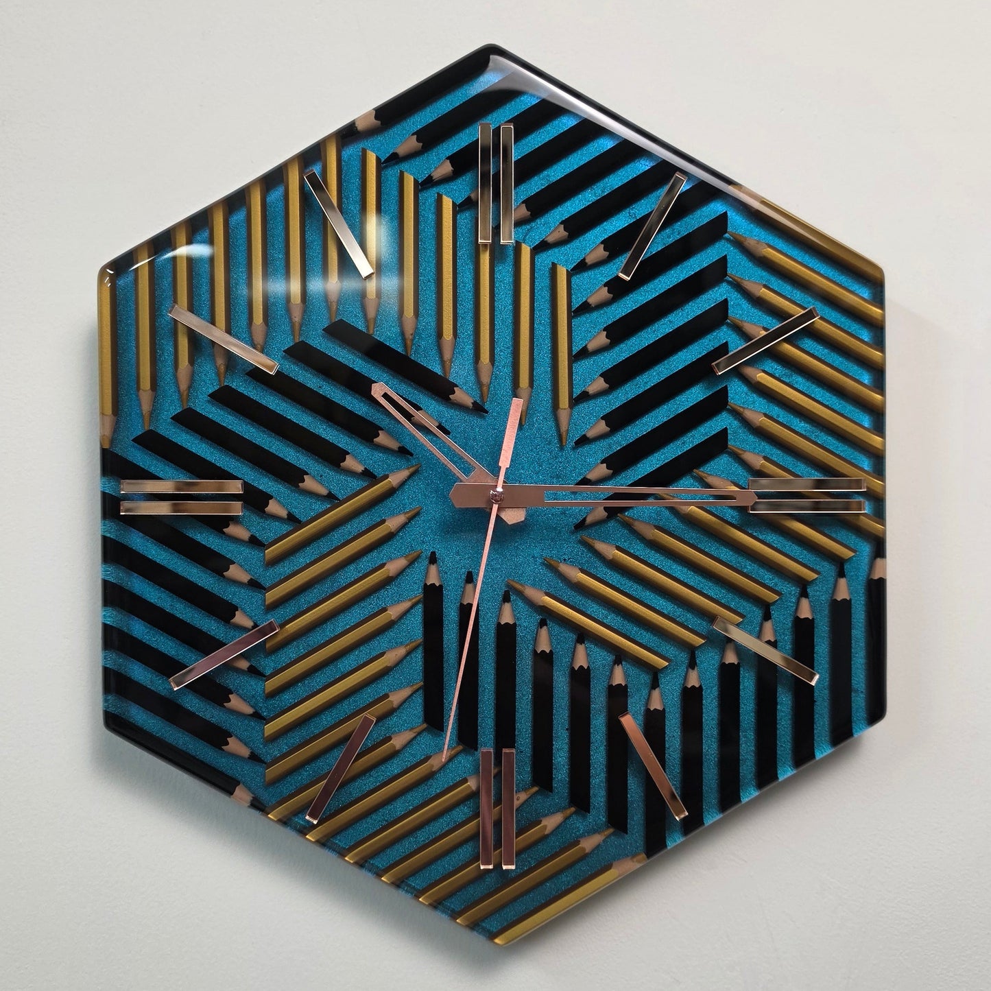 Contemporary artistic clock with colored pencils, glossy resin and mirrored markers