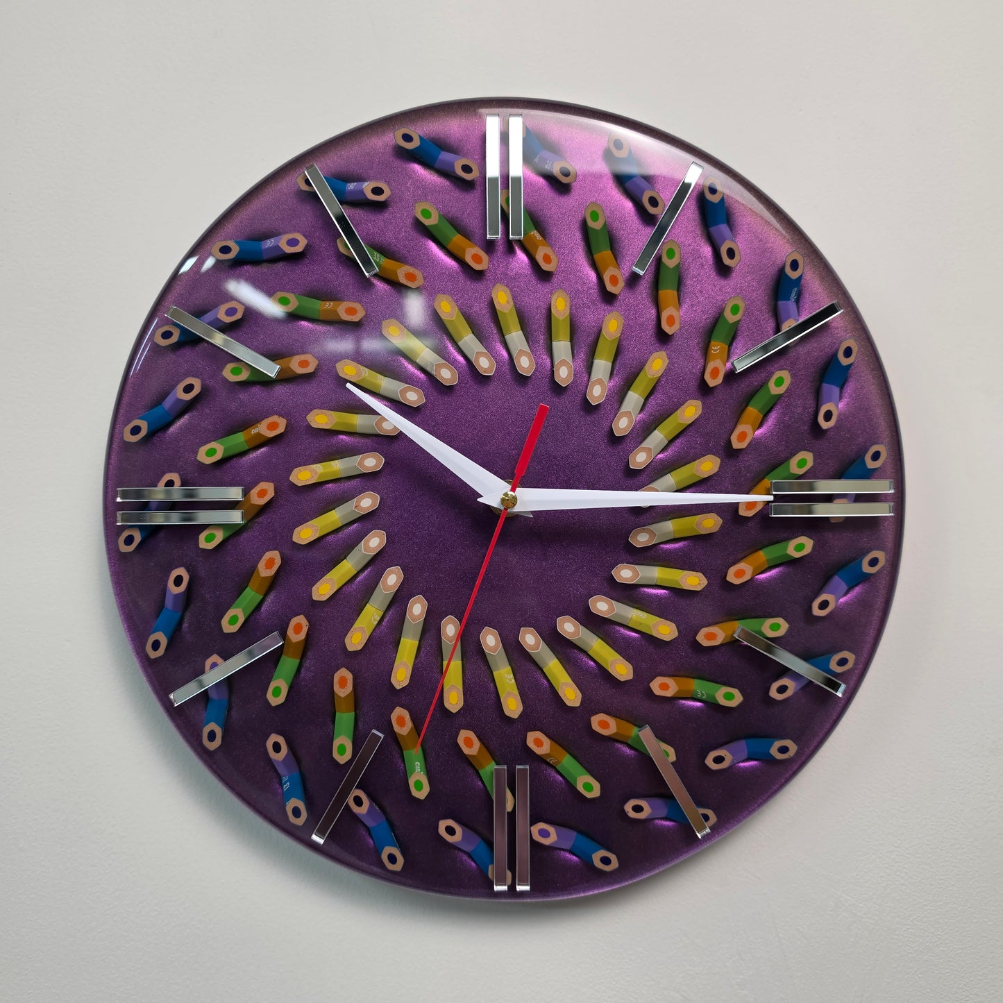Contemporary designer clock made from colored pencils and epoxy resin