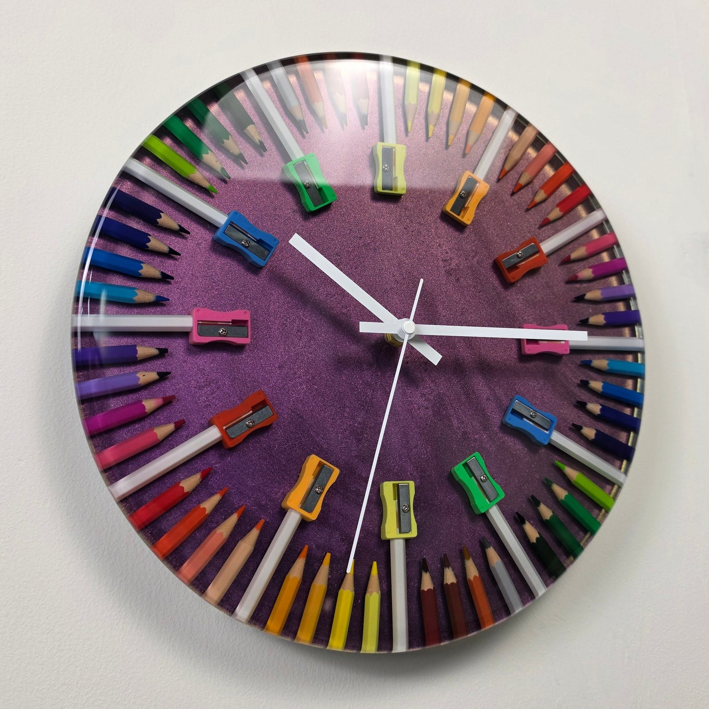 Color Edge wall clock made with colored pencils and pencil shavings in epoxy resin
