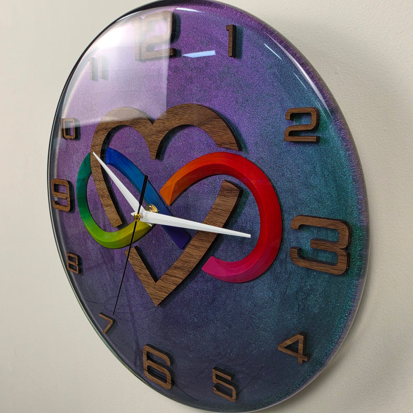 Unique functional art wall clock with black walnut details, colorful infinity symbol and premium epoxy resin