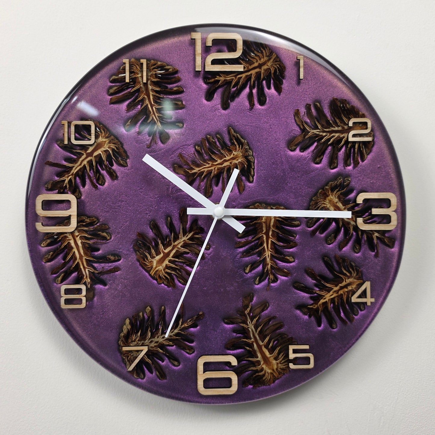 Luxury handmade wall clock with pine cones, metallic epoxy resin background and ash wood numerals