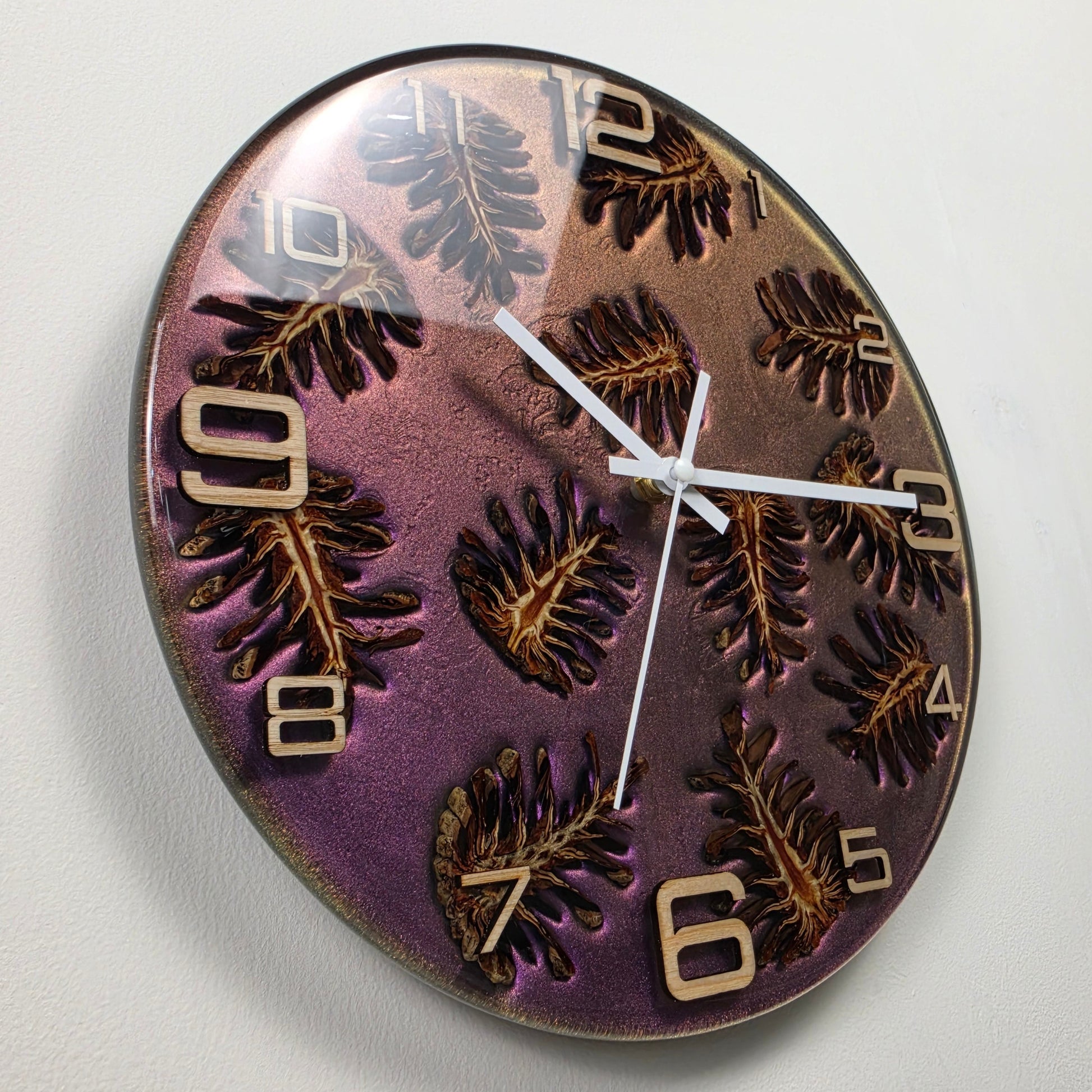 Forest Echoes handmade wall clock with natural pine cones, ash wood numerals and premium epoxy resin