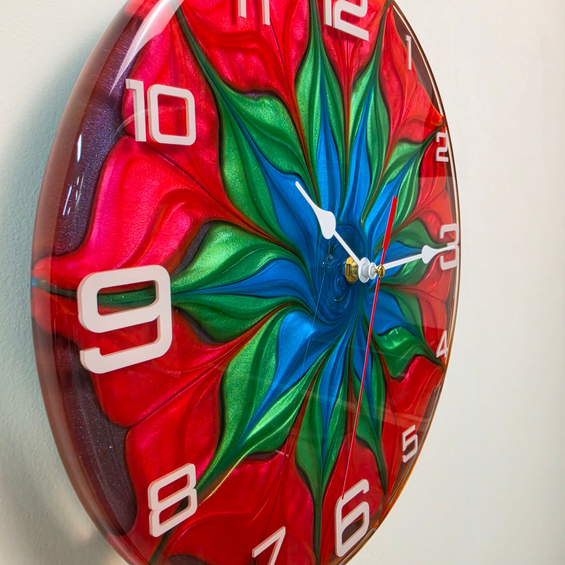 Handcrafted abstract wall clock featuring colorful epoxy resin, white acrylic numerals and original color-blending technique
