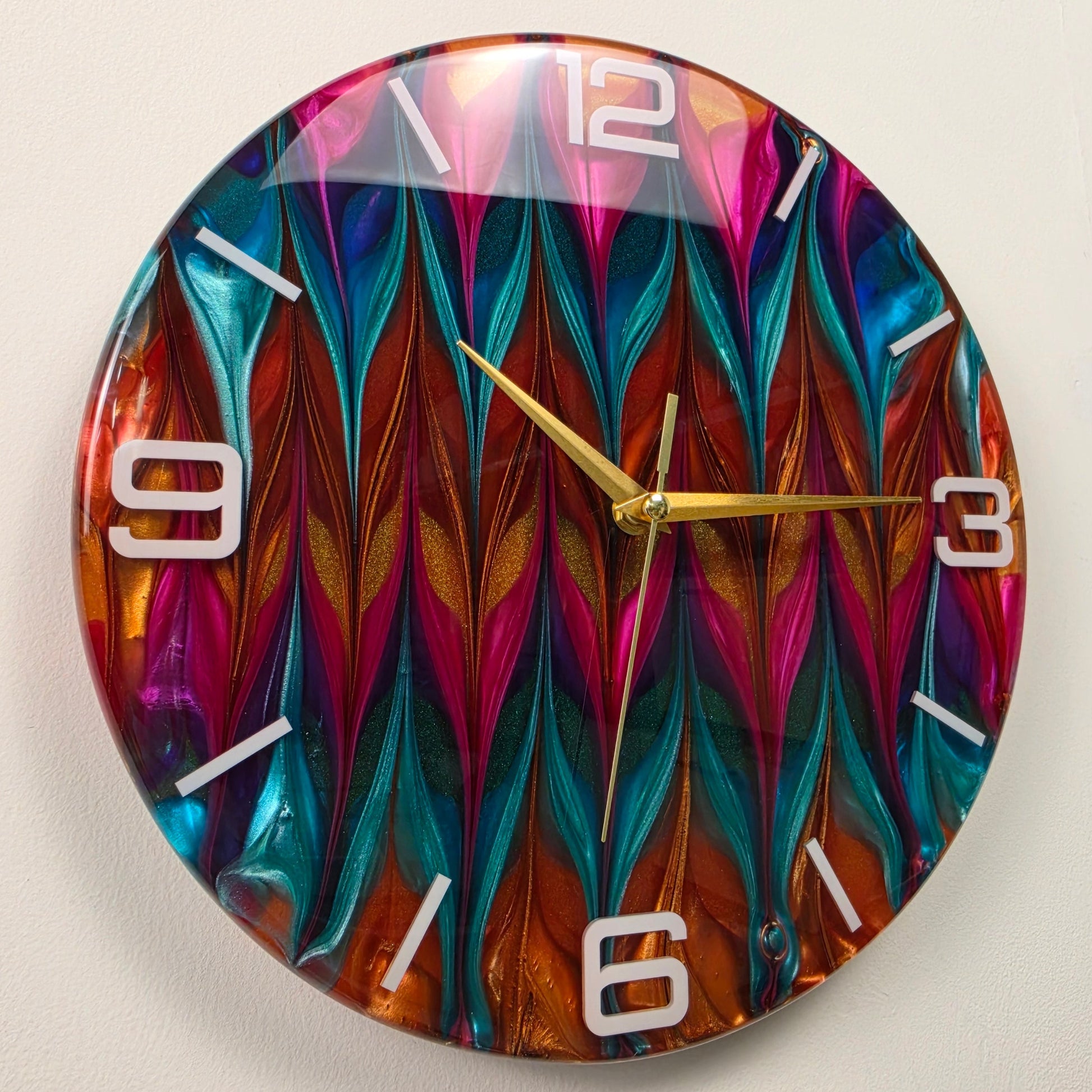 Chromatic Rhythm handmade epoxy resin wall clock with turquoise, magenta and copper-gold abstract patterns.
