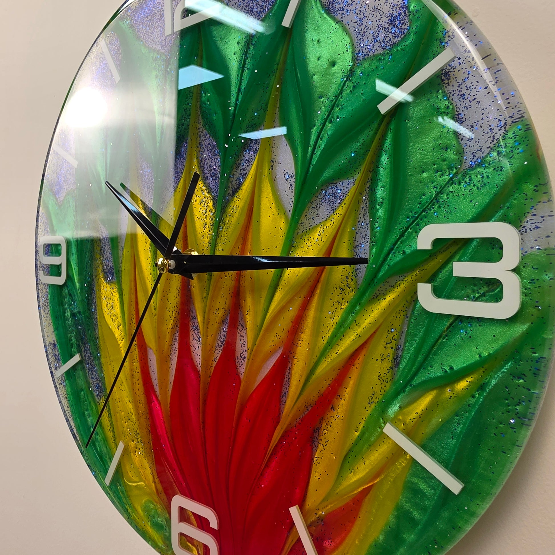 Contemporary Abstract Time wall clock crafted from epoxy resin using an original color-blending technique with vivid green, gold, and red tones.