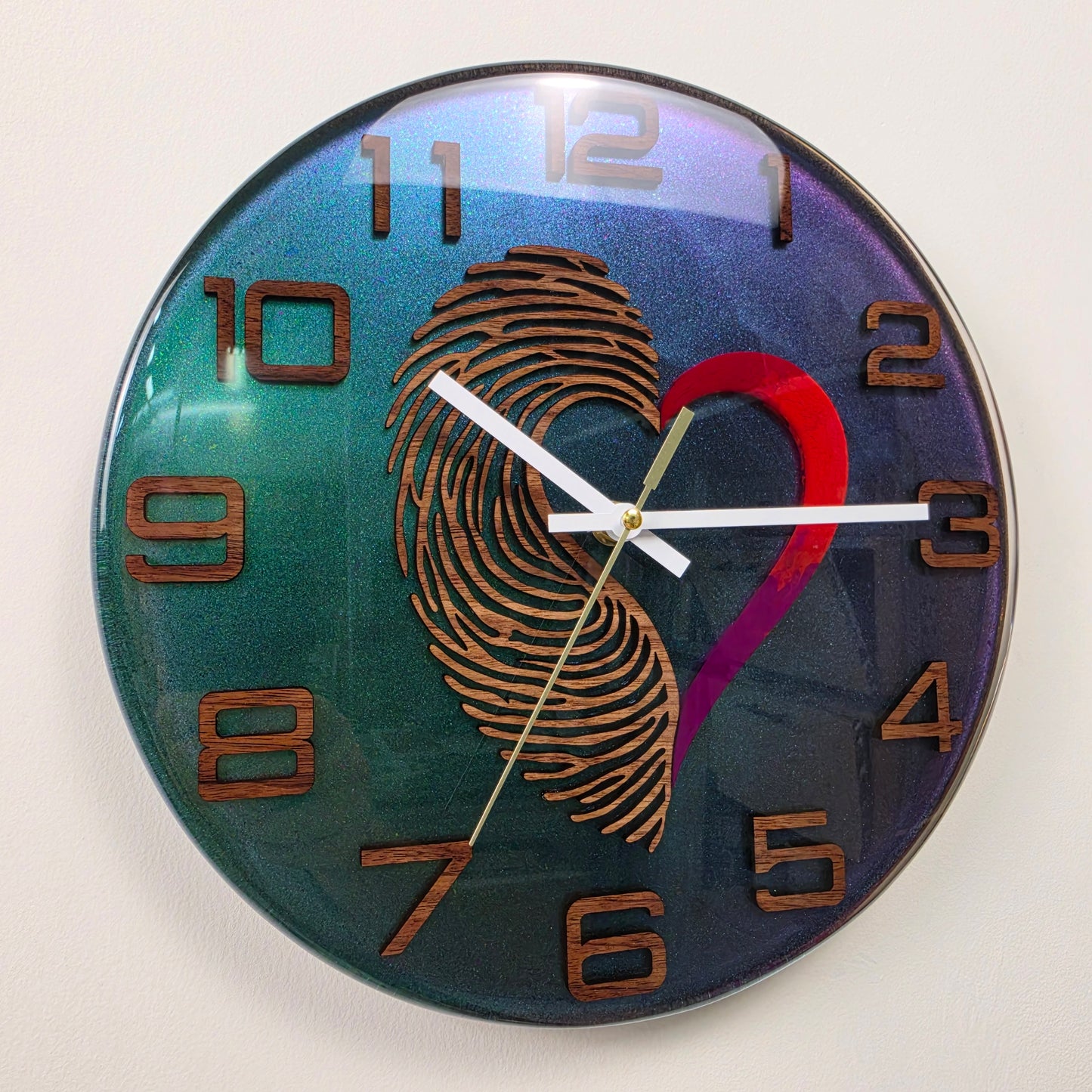 Heartprint handmade resin wall clock with Black Walnut fingerprint, red heart and color-shifting chameleon background