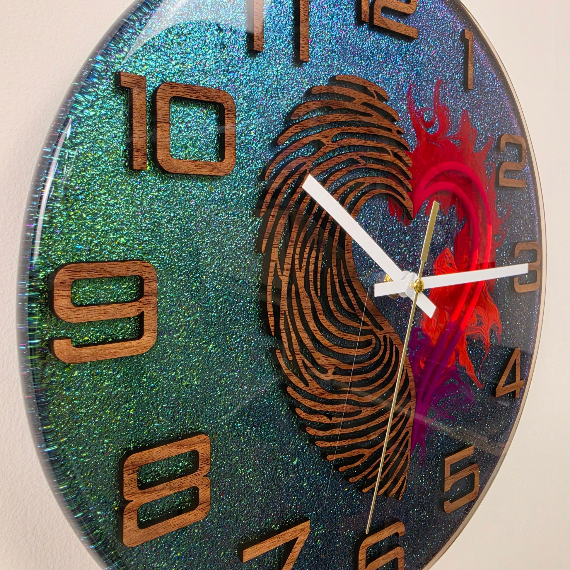Unique artistic wall clock featuring a wooden fingerprint and heart encapsulated in clear resin V2