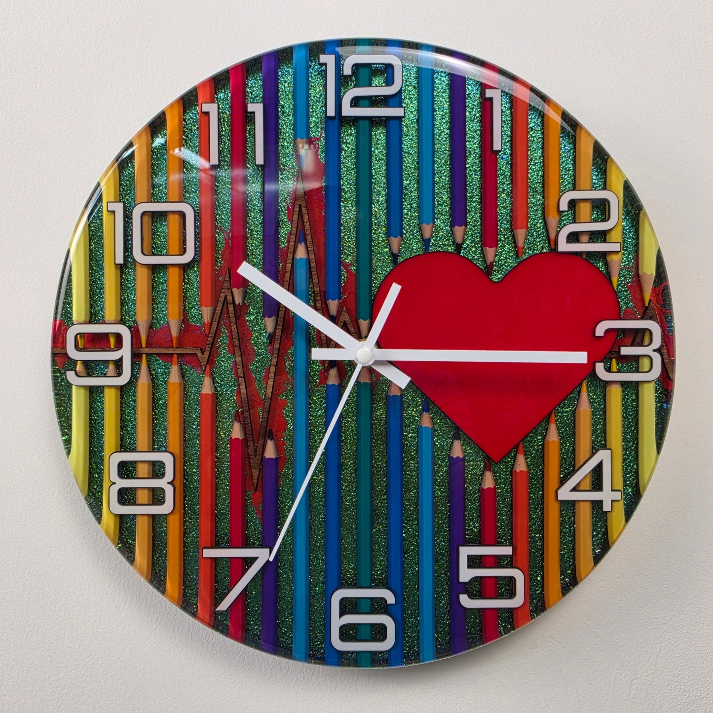 Abstract Time resin wall clock combining colorful pencils, artistic symbolism, silent sweep movement, white acrylic numbers, and a handcrafted chameleon background. V2
