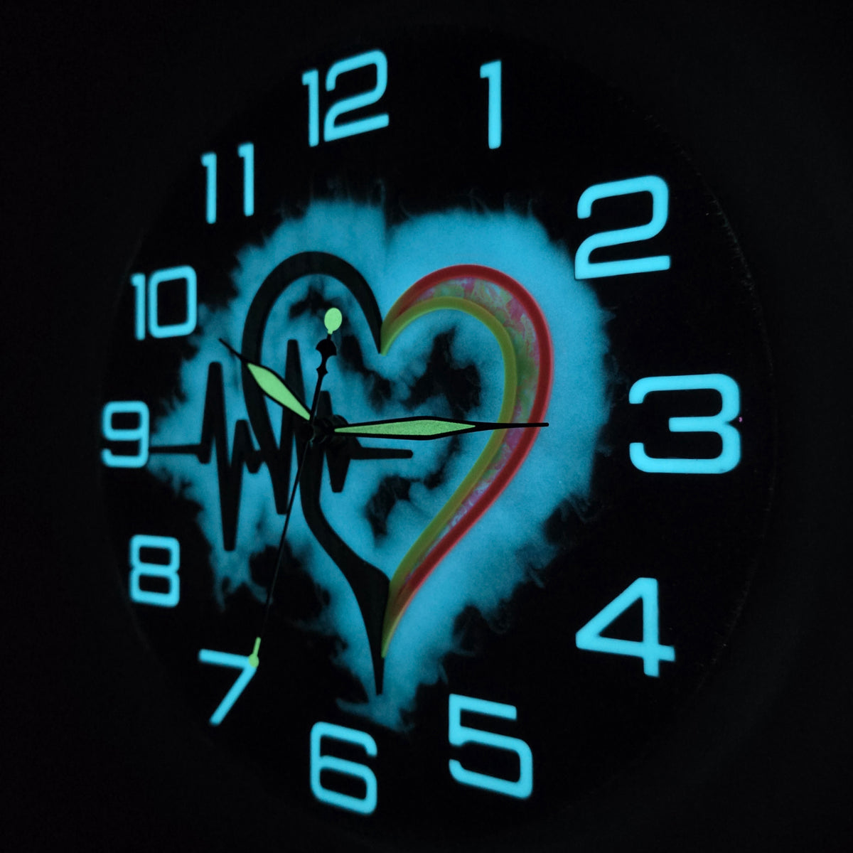Handmade Italian wall clock featuring Black Walnut, resin, chameleon pigment and fluorescent glow effect.