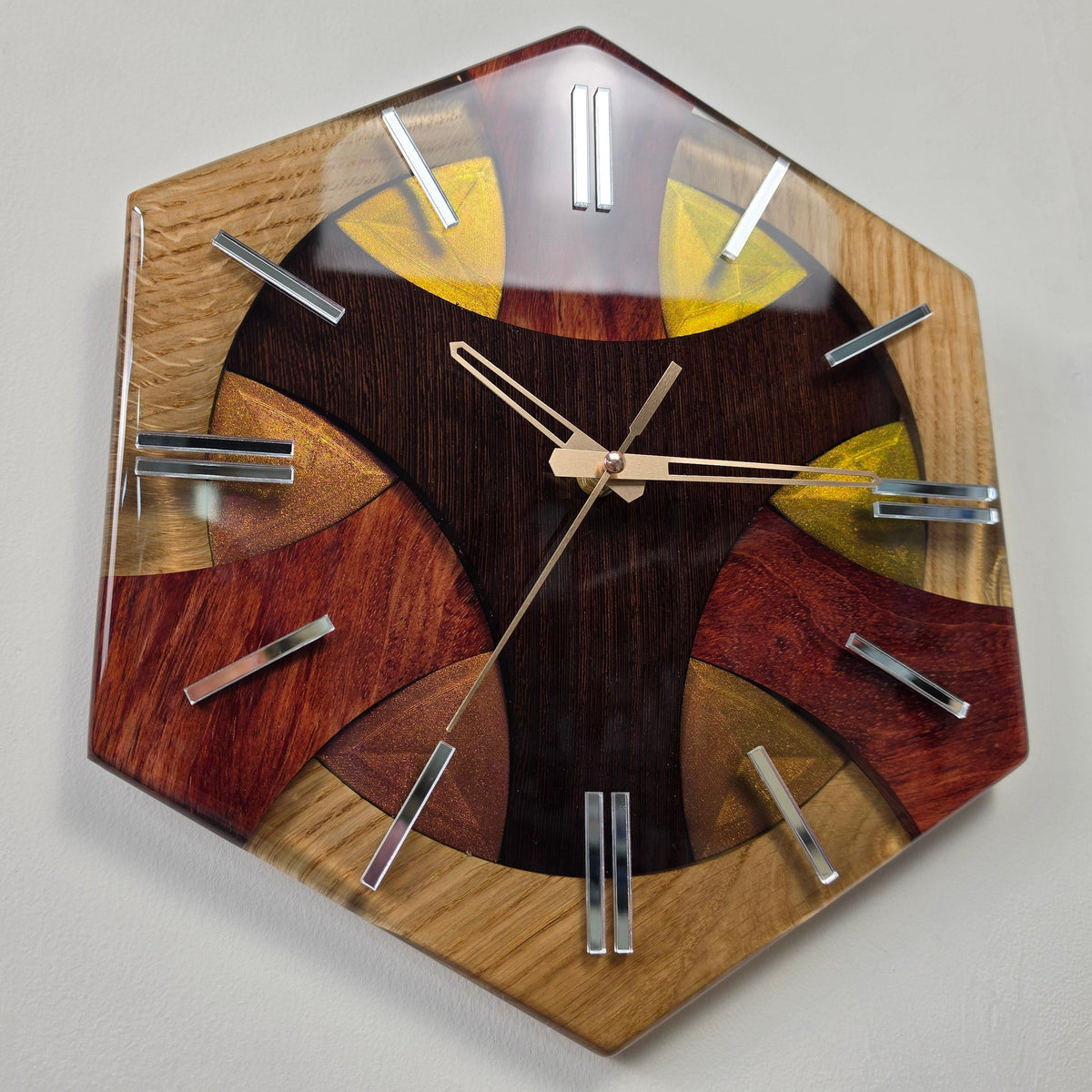 Luxury handmade wood and resin clock from the Wood Line collection featuring three contrasting exotic and natural woods.