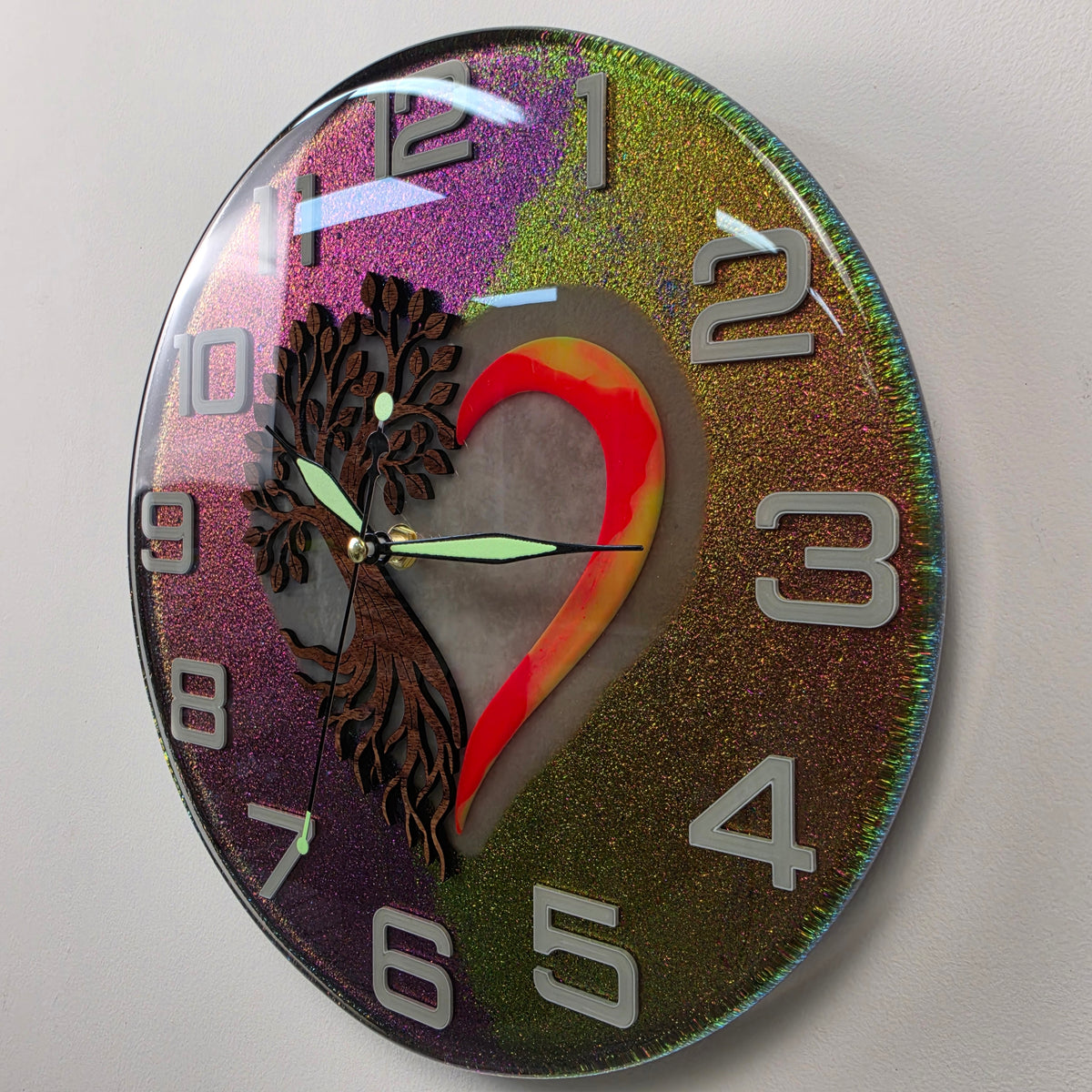 Roots of Life artistic wall clock combining a wooden Tree of Life with a heart and high-gloss resin finish.