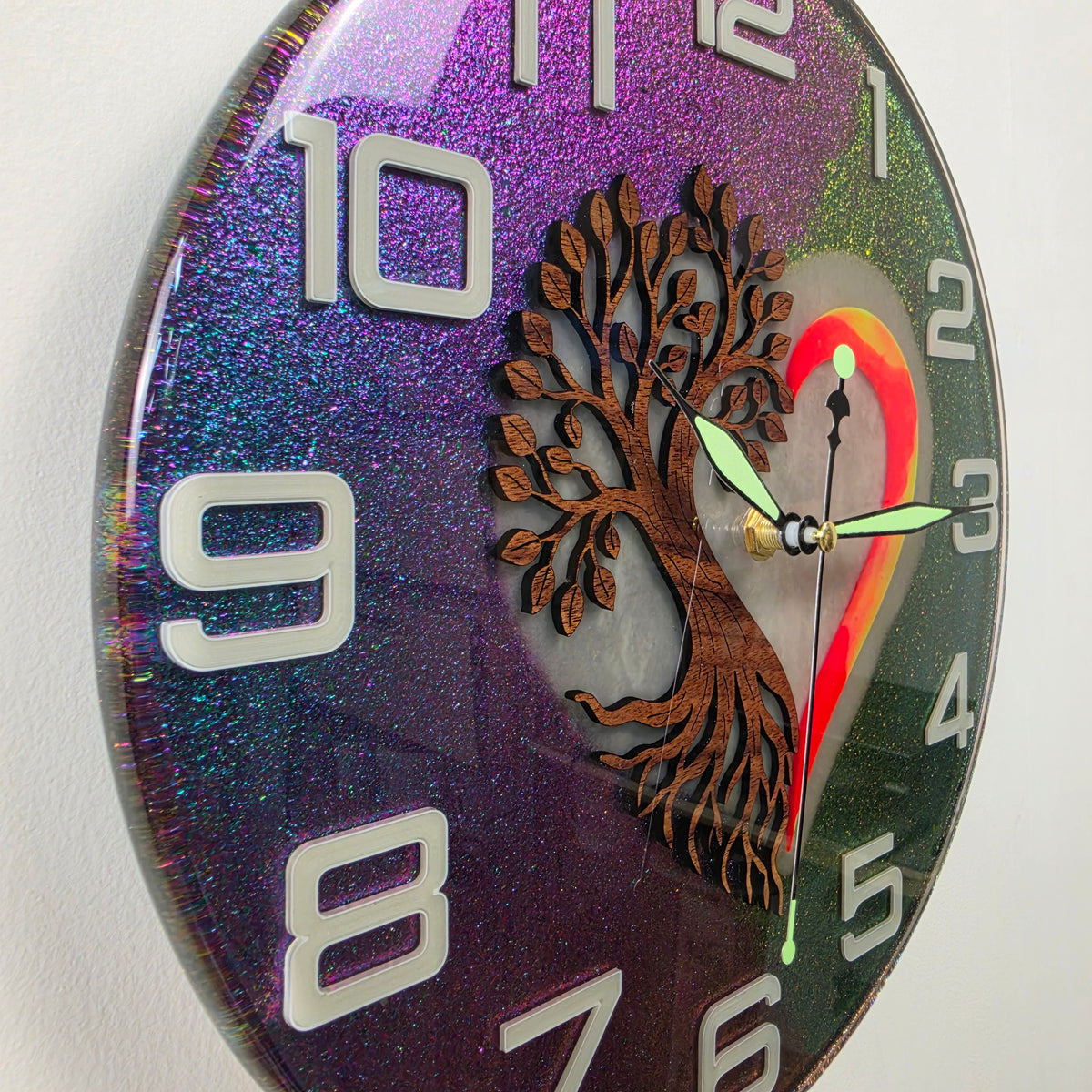 Handmade Tree of Life wall clock featuring Black Walnut wood, colorful heart and shimmering chameleon effect.