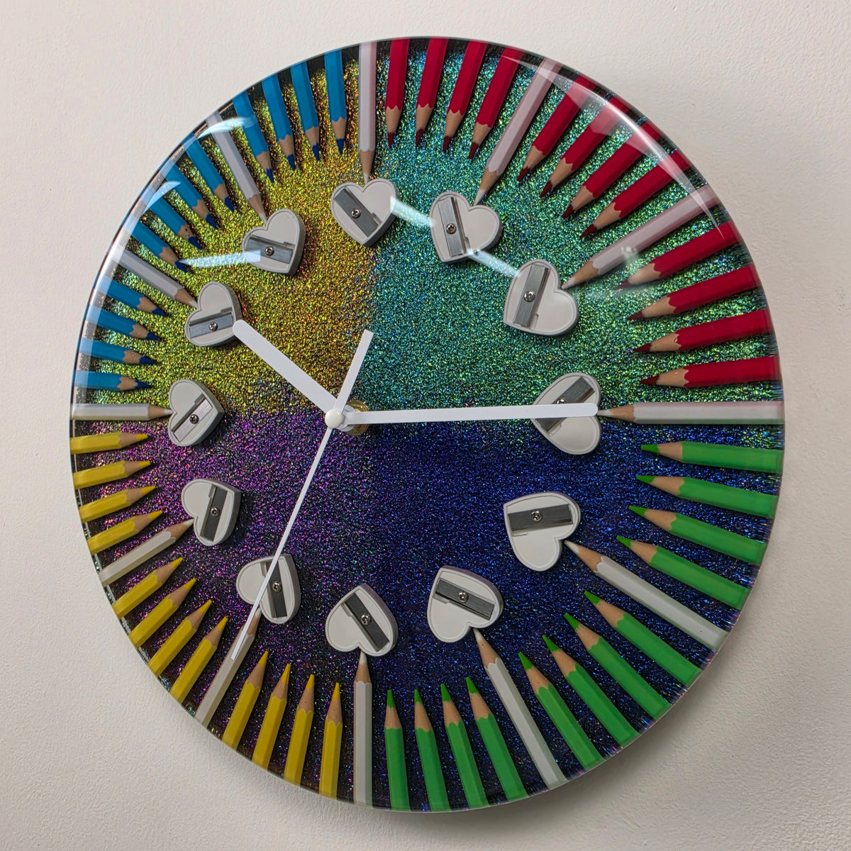 One-of-a-kind Studio Colors wall clock inspired by the four seasons, handmade with colored pencils and epoxy resin.