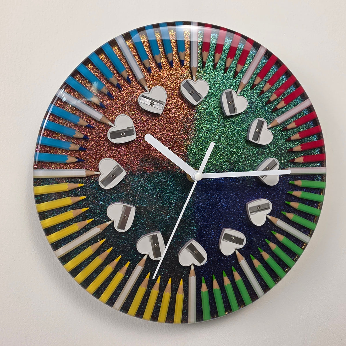 Decorative handmade Four Seasons wall clock with vibrant colored pencils, glossy epoxy resin and an iridescent chameleon effect.