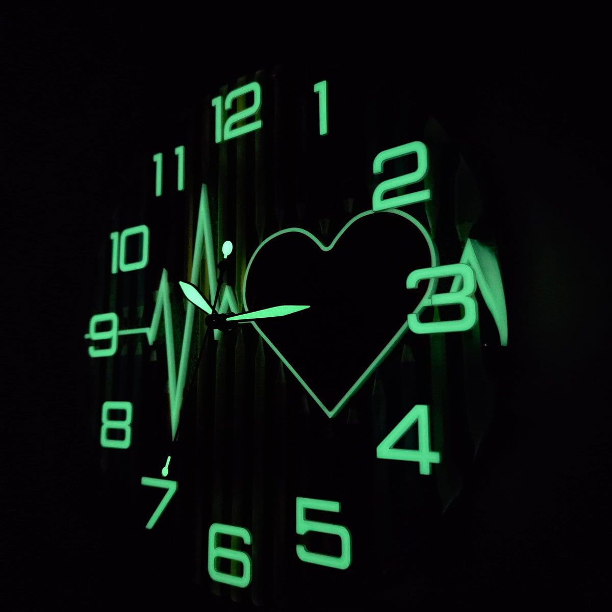 One-of-a-kind handmade resin clock with colorful pencils and heart design transforming into a glowing artwork after dark.