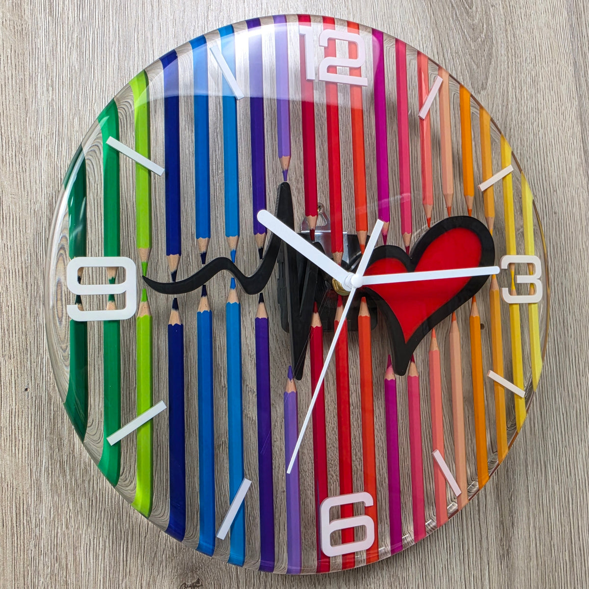 Studio Colors Heartbeat handmade wall clock with colored pencils and transparent epoxy resin