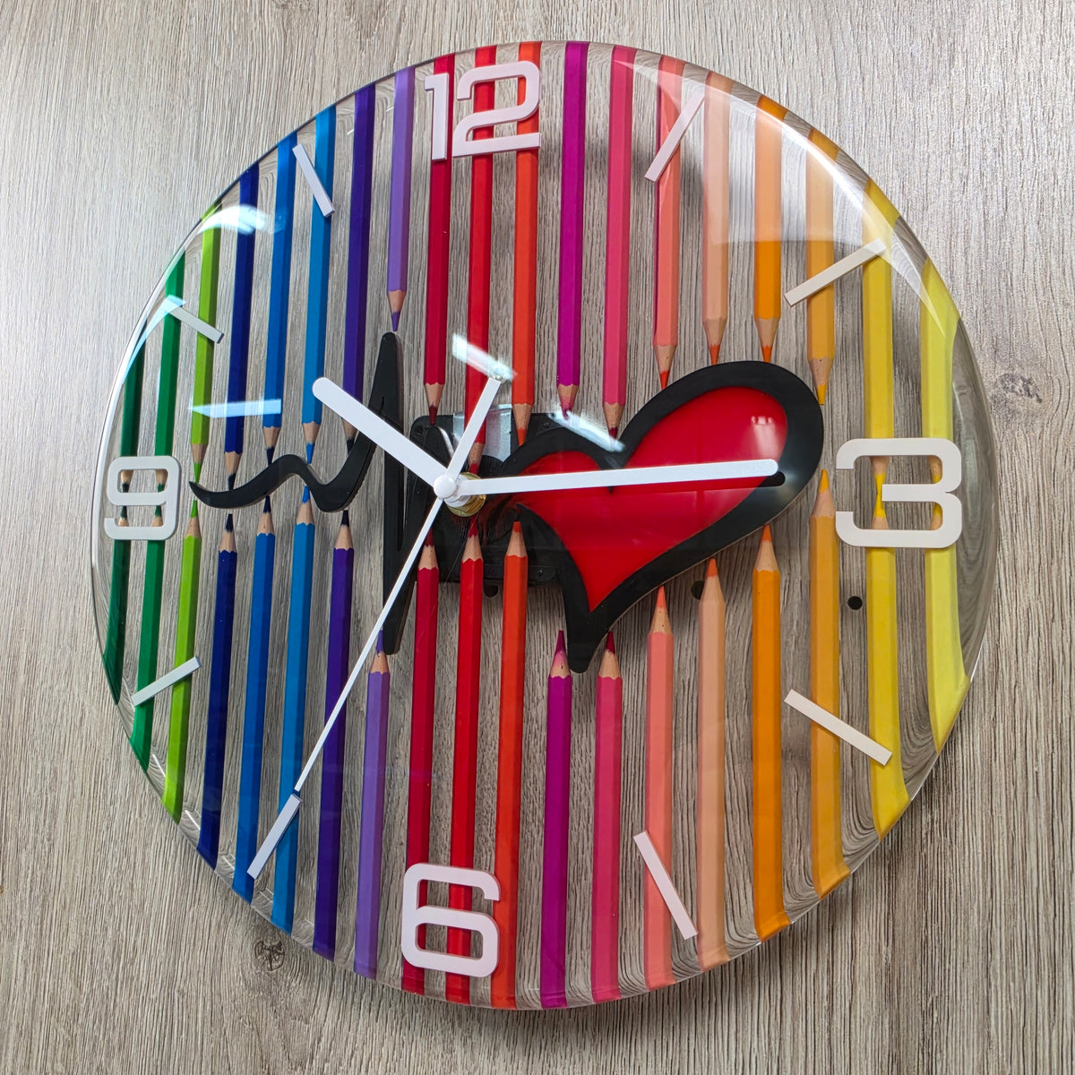 Studio Colors Heartbeat artistic wall clock handcrafted from colored pencils and clear resin