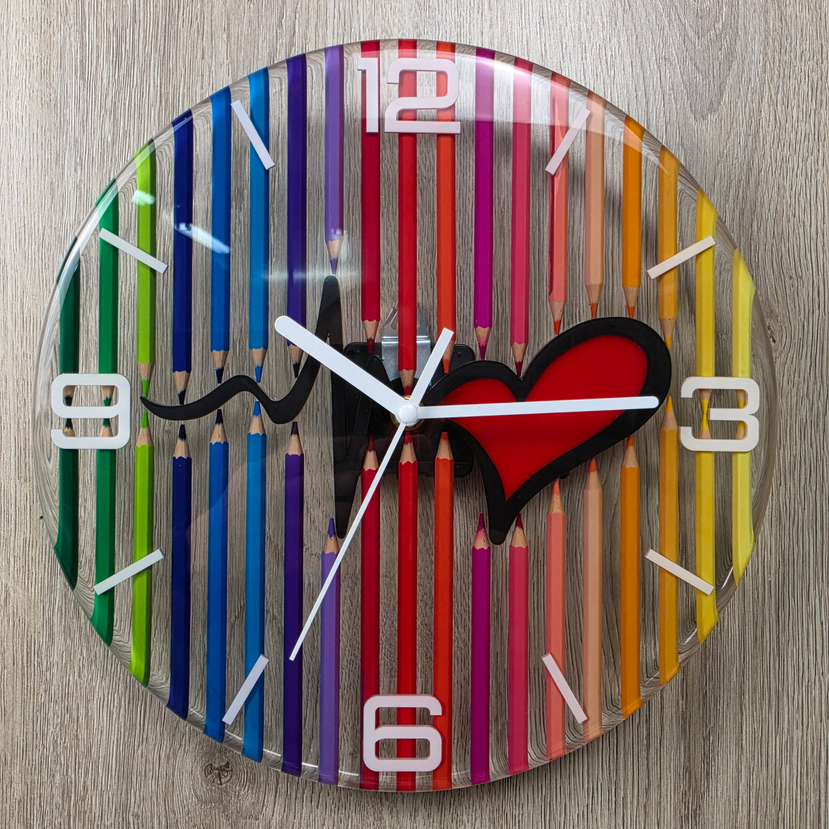 Colorful handmade resin wall clock with heartbeat design and transparent see-through background