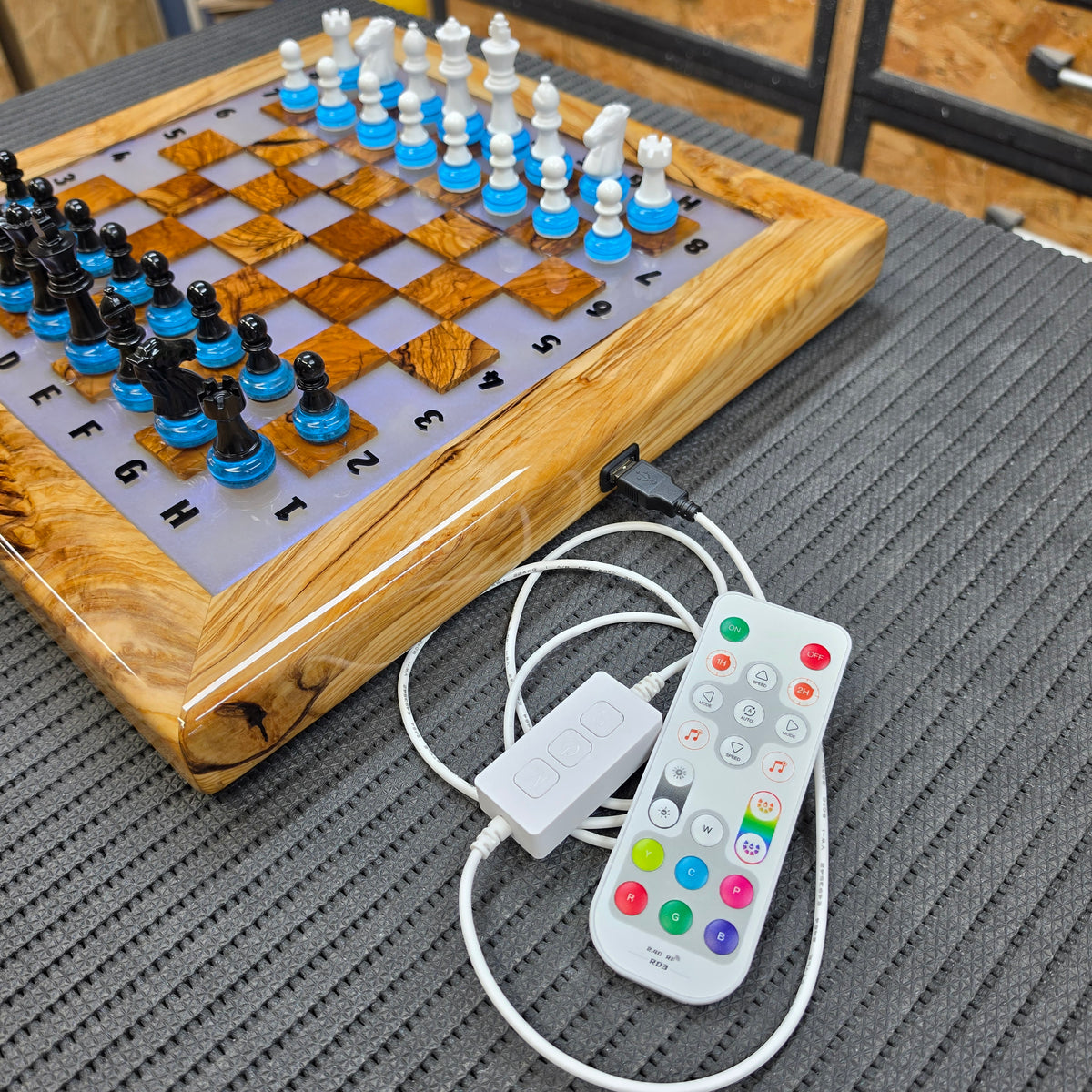 Luce di Strategia handmade olive wood and resin illuminated chessboard