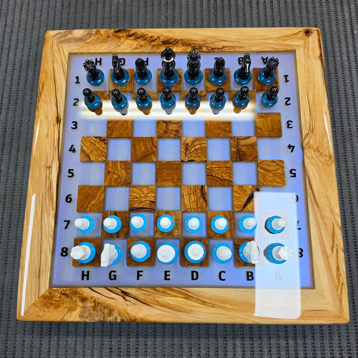 Luxury handcrafted olive wood chess set with multicolor LED illumination