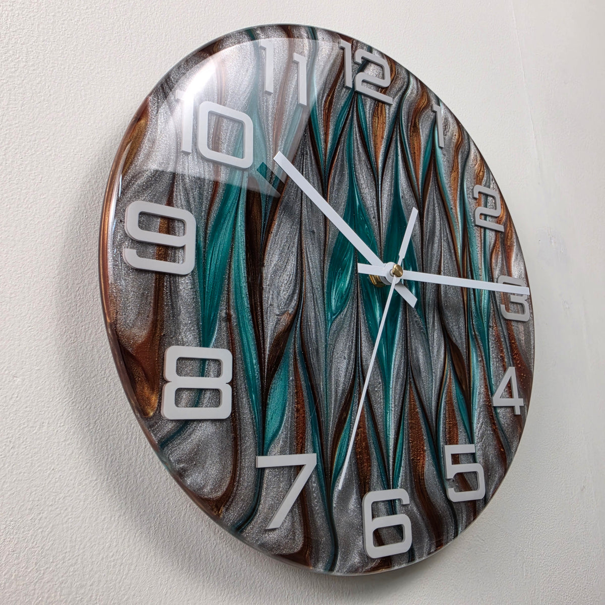Detailed view of Metallic Tides resin artwork highlighting its fluid patterns, reflective pigments and glossy surface.