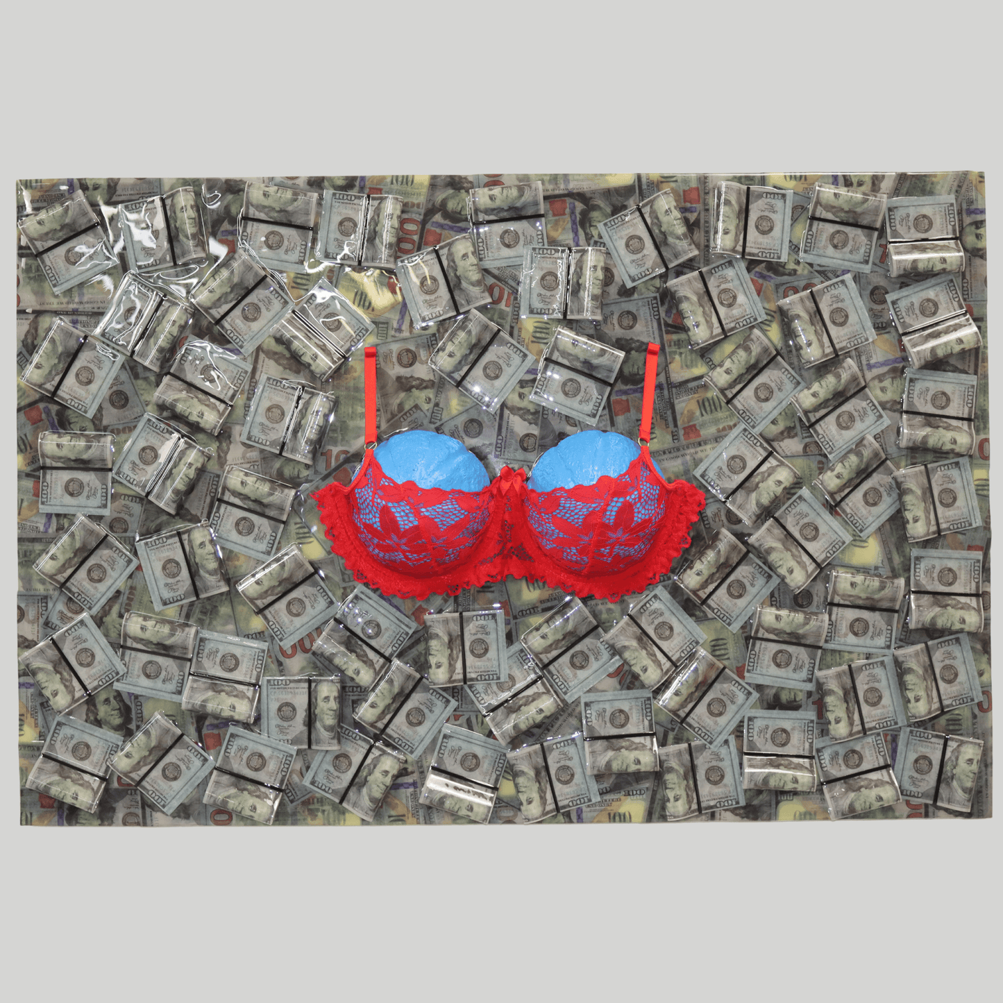 Mondo Blu conceptual artwork – contemporary installation with blue plaster busts, red bra and scattered dollar bills, front view