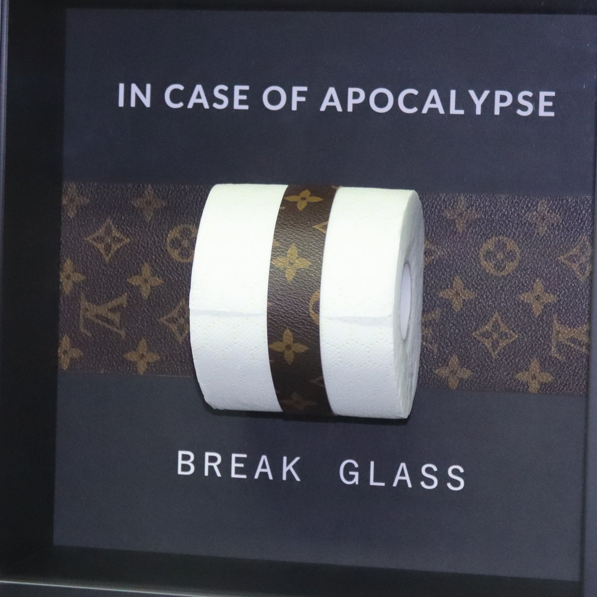 Priorità artwork – detailed close-up of conceptual installation with toilet paper and luxury branding