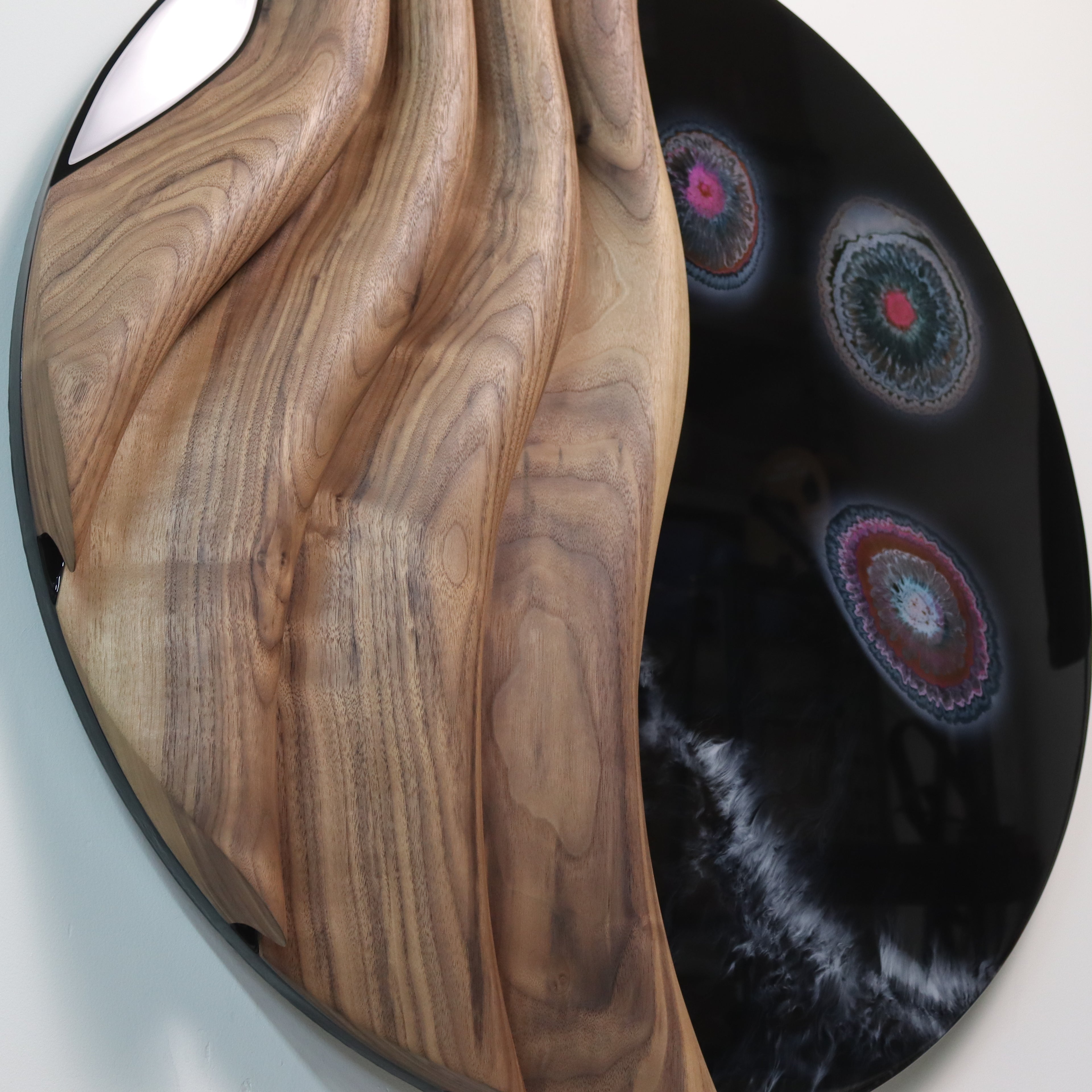 Side view showing depth and layered wooden wave structure