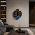Detail of Orbita wall sculpture highlighting glossy resin surfaces, natural wood texture and geometric rhythm