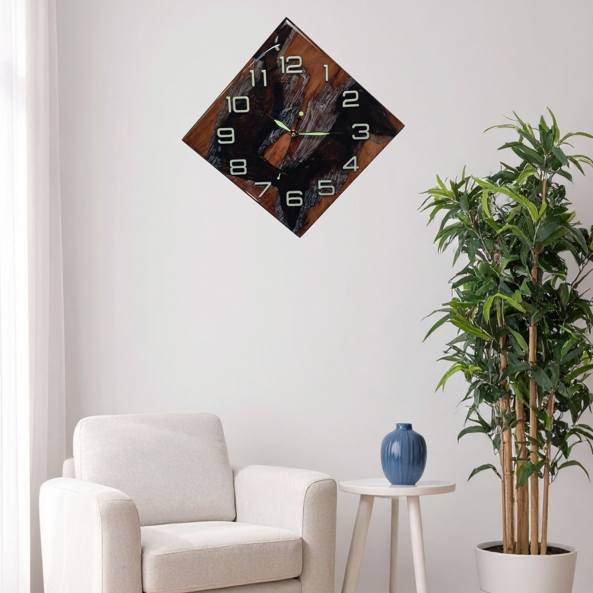 Artistic walnut and resin wall clock hanging on the wall, glowing naturally with elegant contrast and craftsmanship.