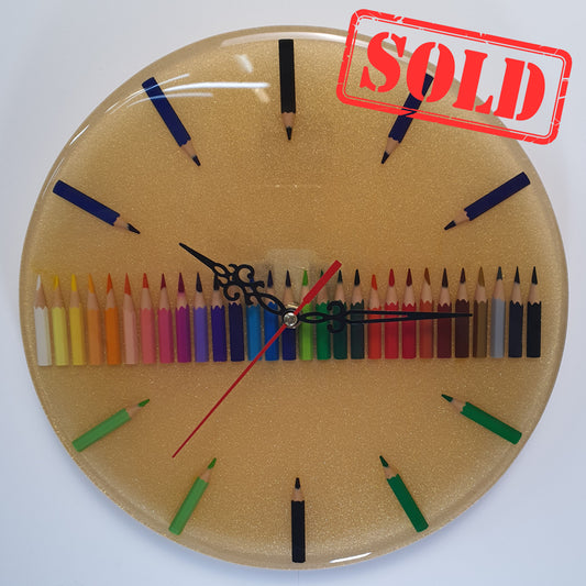 Color Time epoxy resin wall clock with colored pencils – full front view