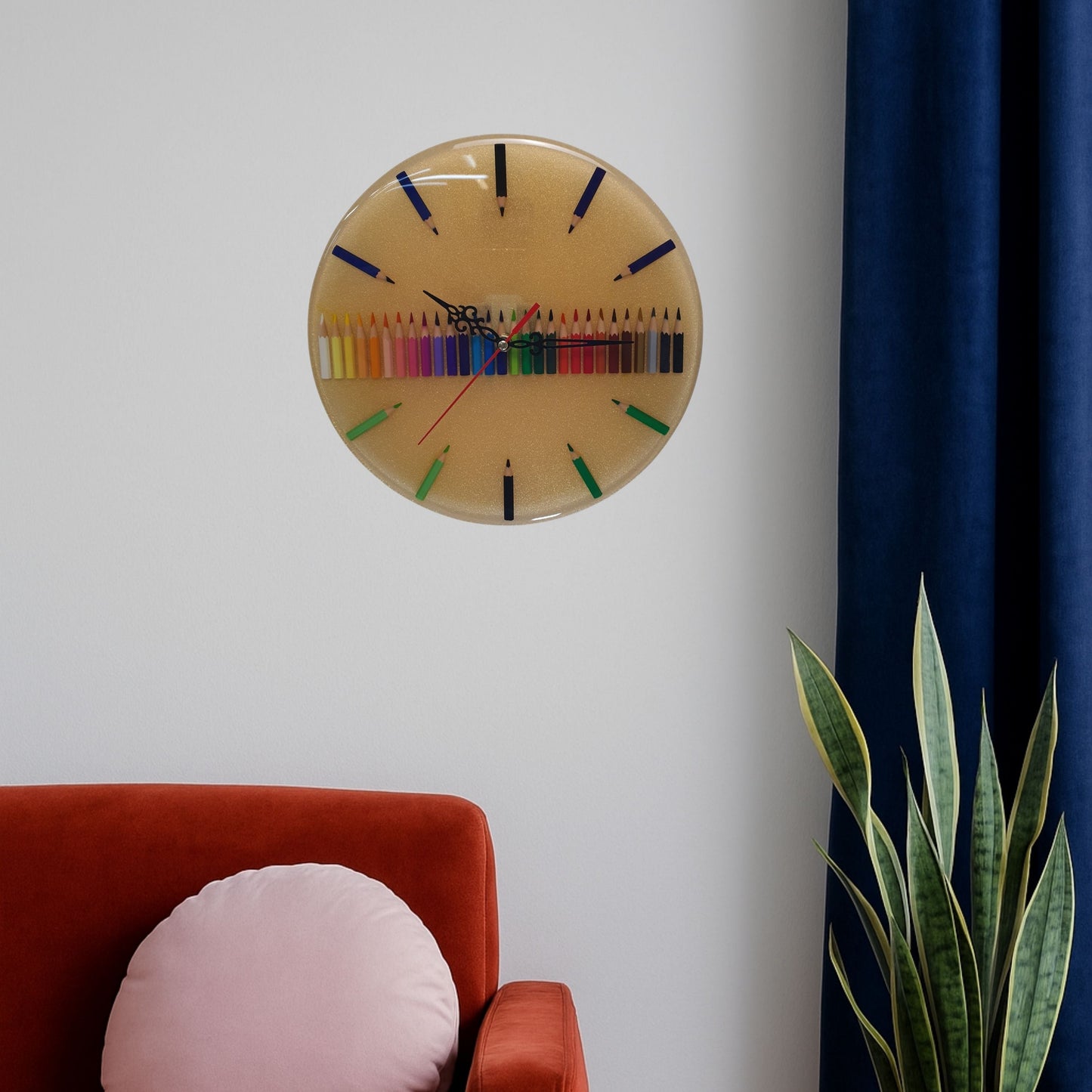 Decorative resin wall clock with colored pencils hanging in interior setting