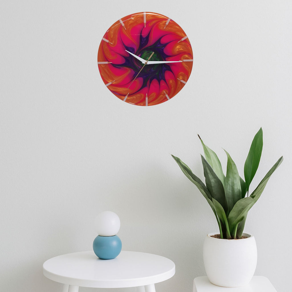 The “Neon Spiral” clock hanging on a white wall, radiating vibrant energy and color
