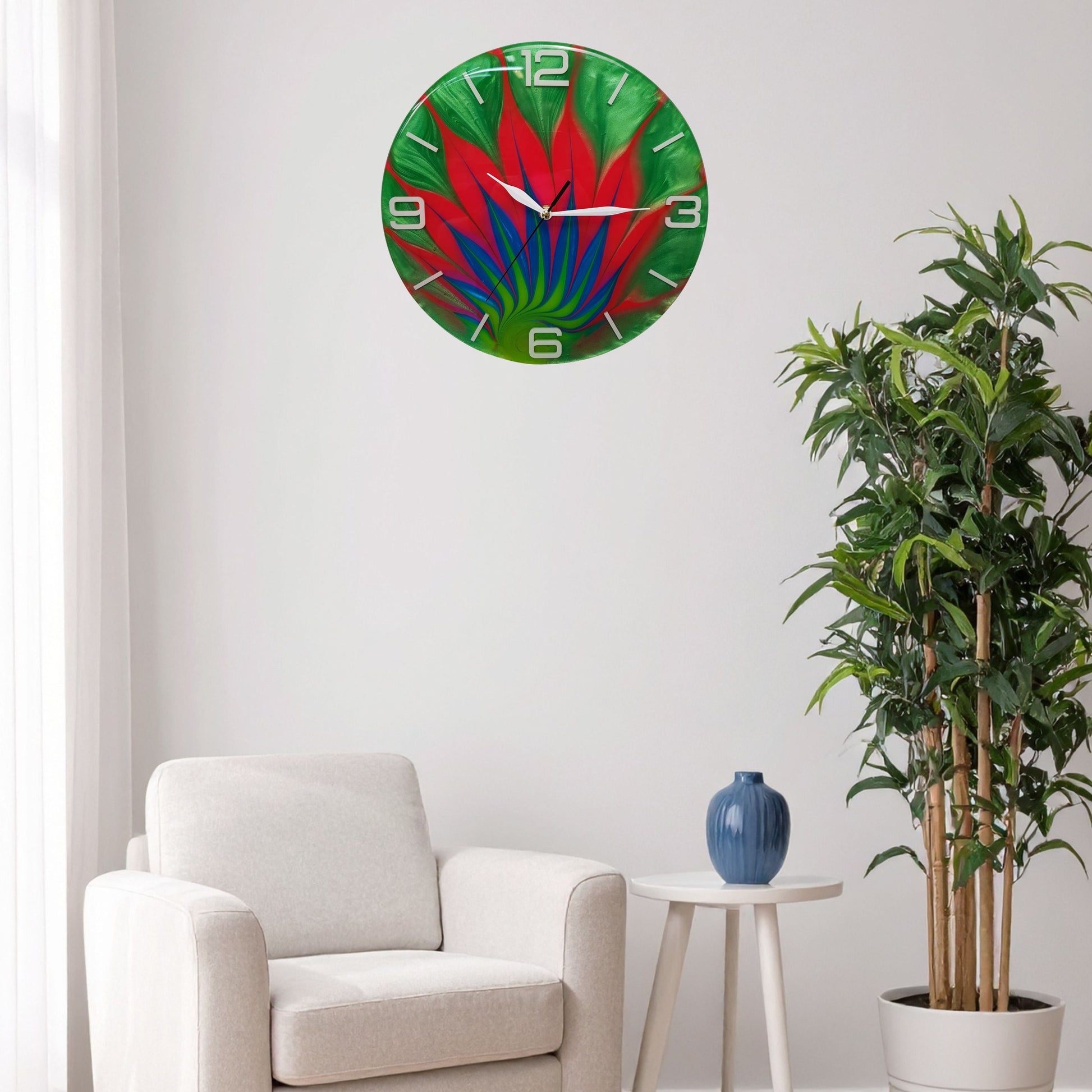 “Wild Leaf” wall clock displayed on a white wall, showing its vivid presence in an interior setting.