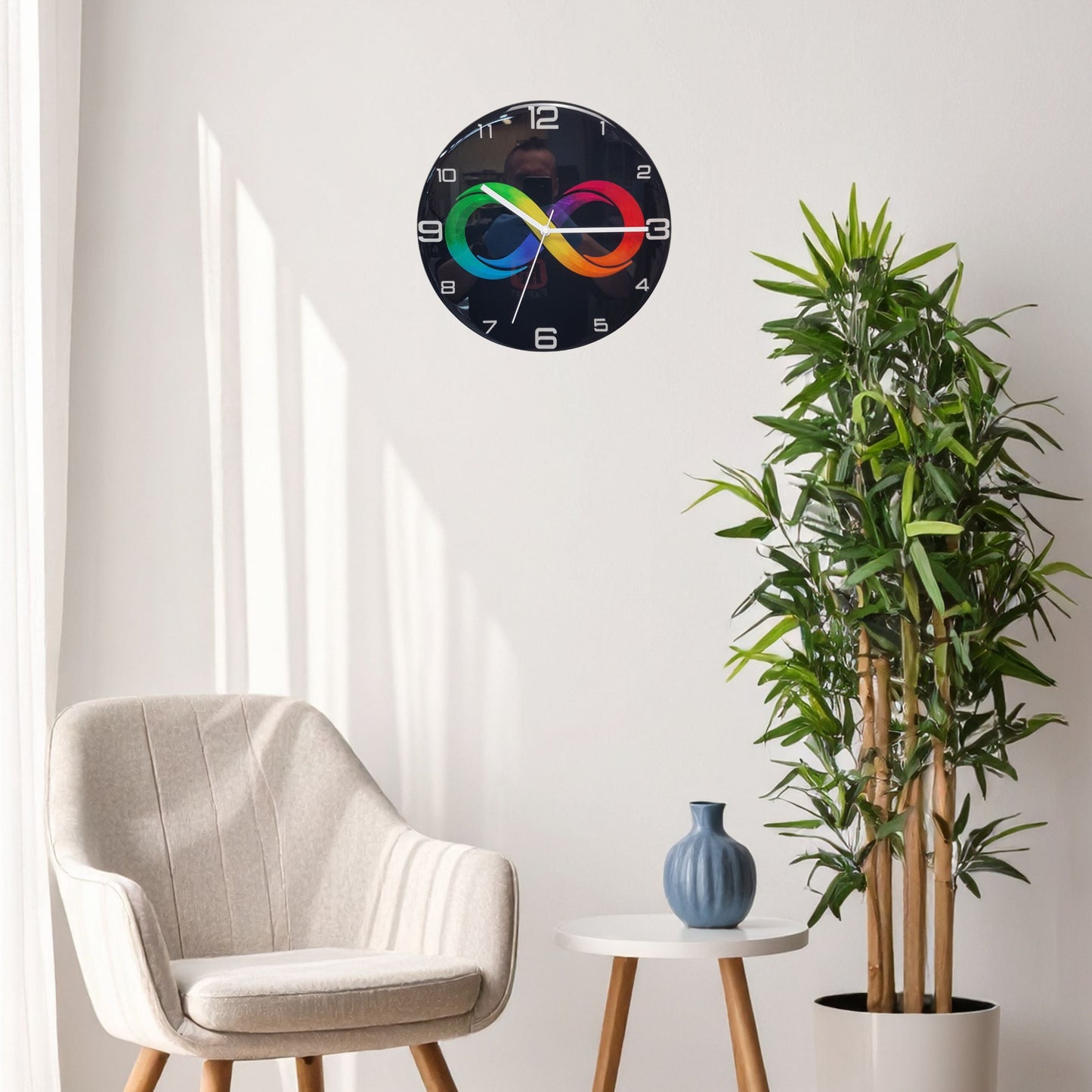 Black Infinity clock displayed on a wall as a modern resin art statement piece