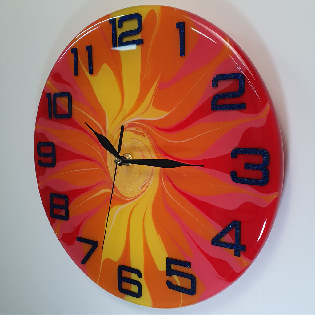 Angled side view of the "Fire Bloom" clock – highlighting the resin thickness and curved edge