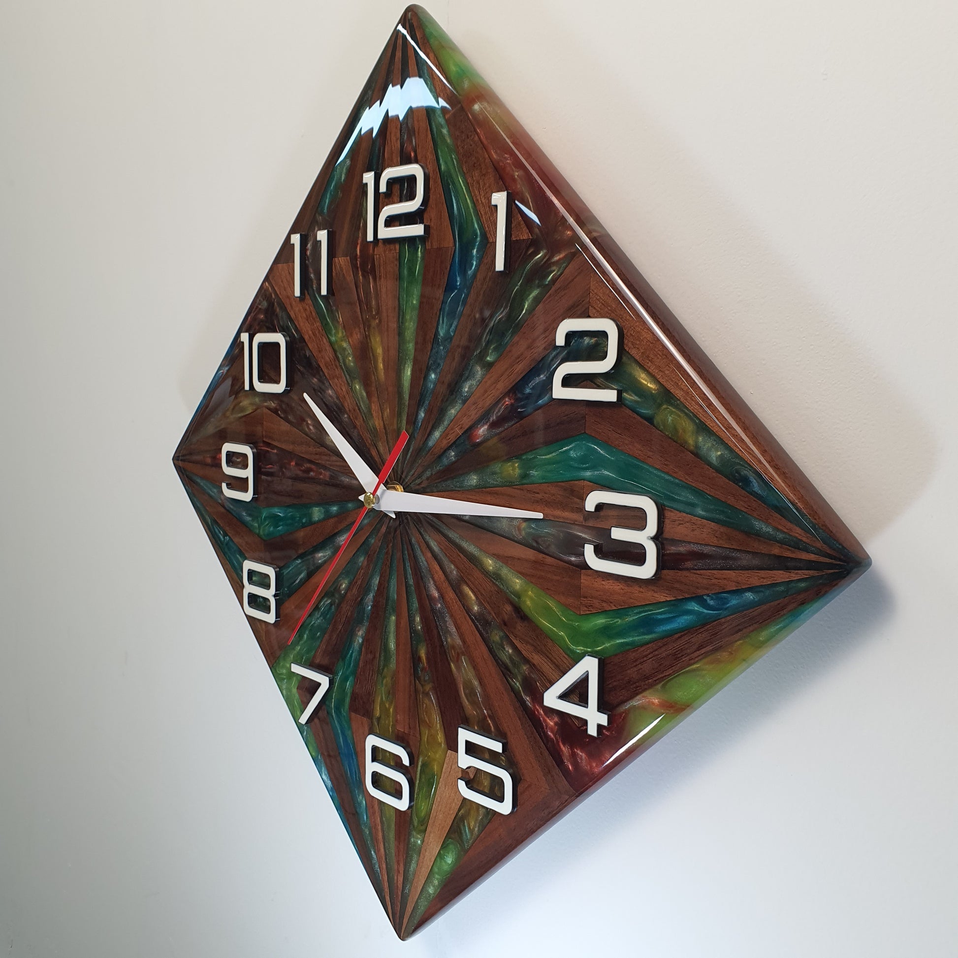 Left side view of the "Walnut Prism" clock – clean resin edge and layered wood structure